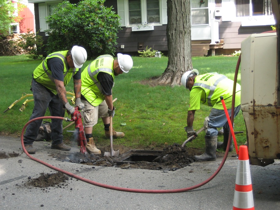 Men working on catch basin asset