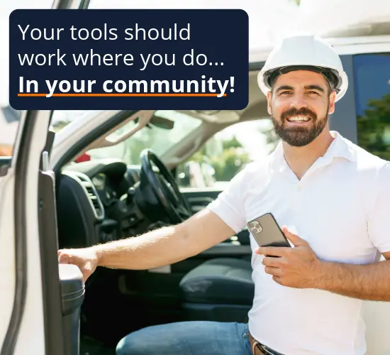 Code enforcement officer exits truck with phone, showcasing iWorQ’s mobile tools.